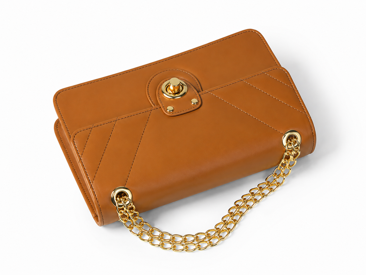 Vogue brown handbag with flap open, top view
