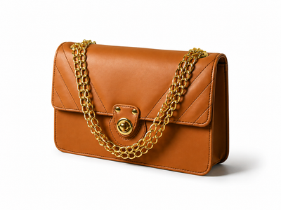 Vogue brown handbag with gold chain, angled view